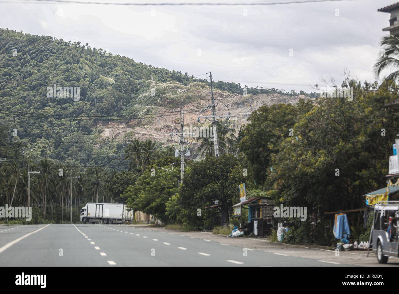 Santo Tomas, Batangas, Philippines. Oct 11, 2026: A quarried hillside ...