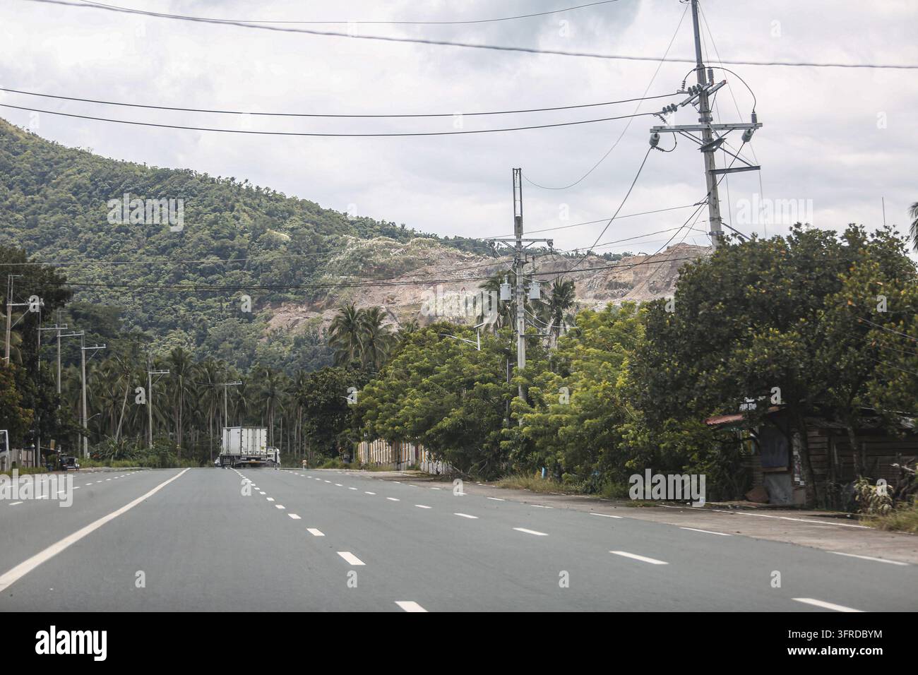 Santo Tomas, Batangas, Philippines. Oct 11, 2026: A quarried hillside ...