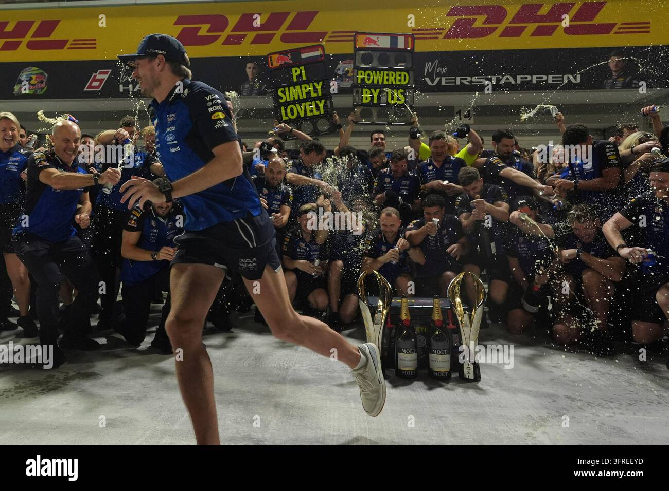 Water Races Formula Red Bull driver Max Verstappen of the Netherlands, runs to avoid spray ...