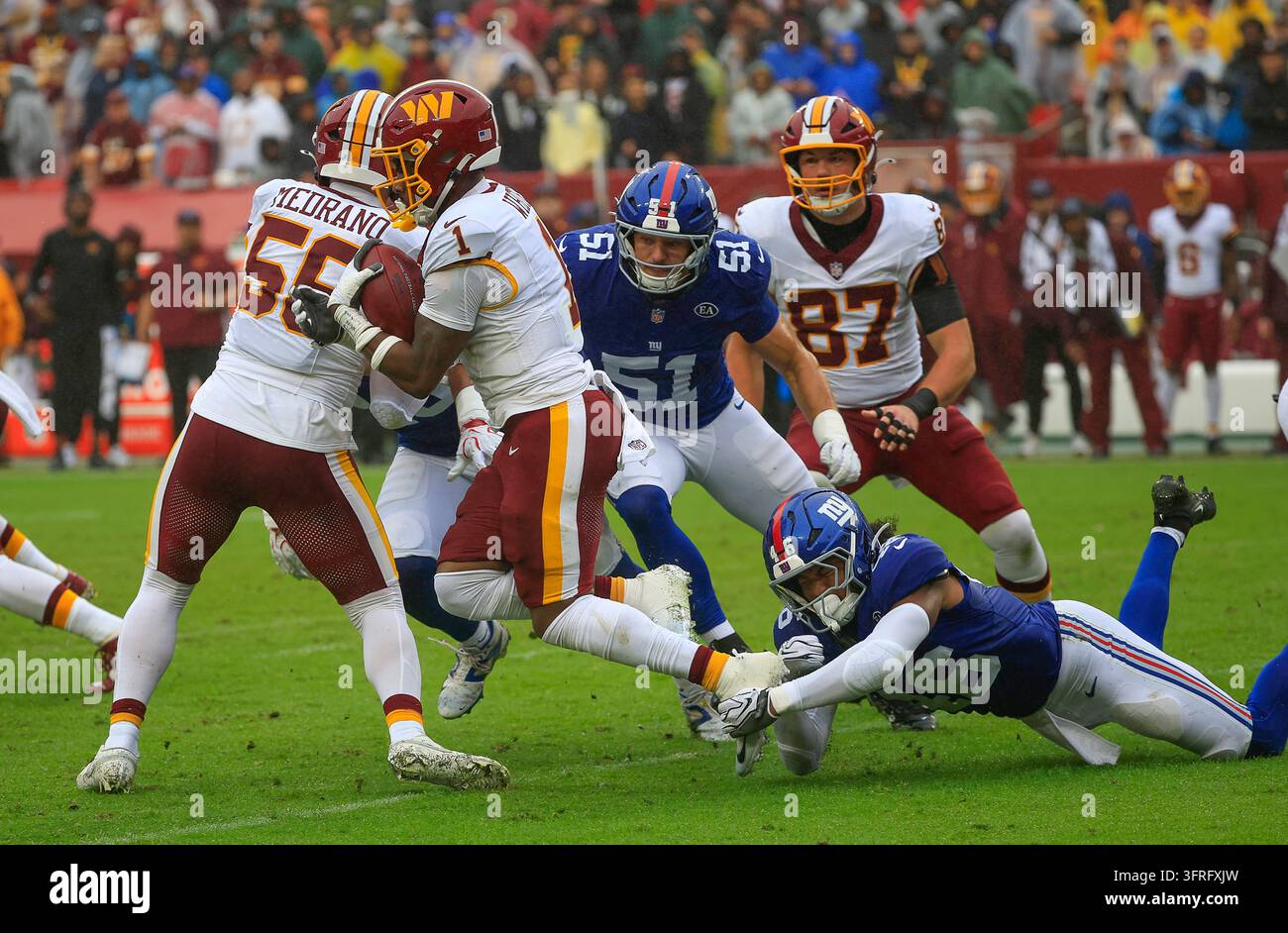 Commanders Vector October 11, 2026: Washington Commanders RB #1 Rachaad White is tripped ...