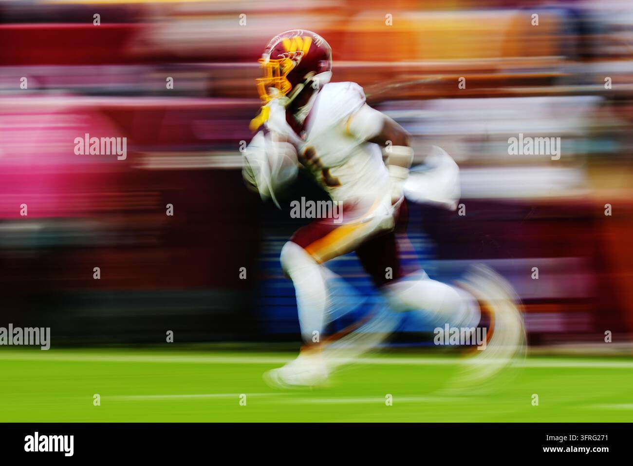 Commanders Vector Washington Commanders' Rachaad White (1) returns a punt during the ...