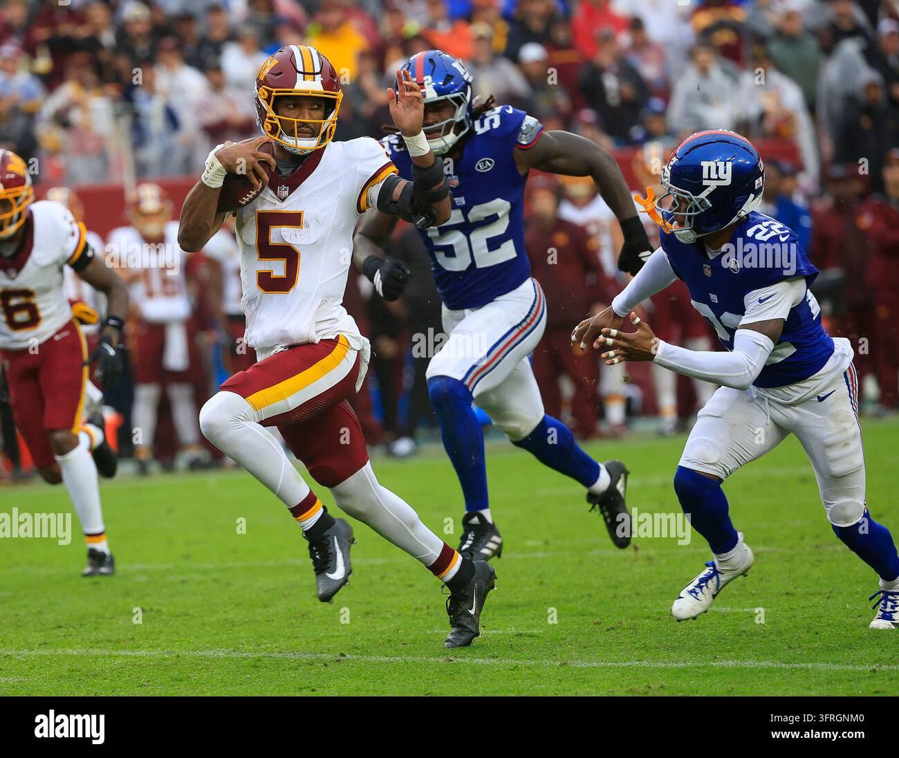 Commanders Vector October 11, 2026: Washington Commanders QB #5 Jayden Daniels runs for a ...