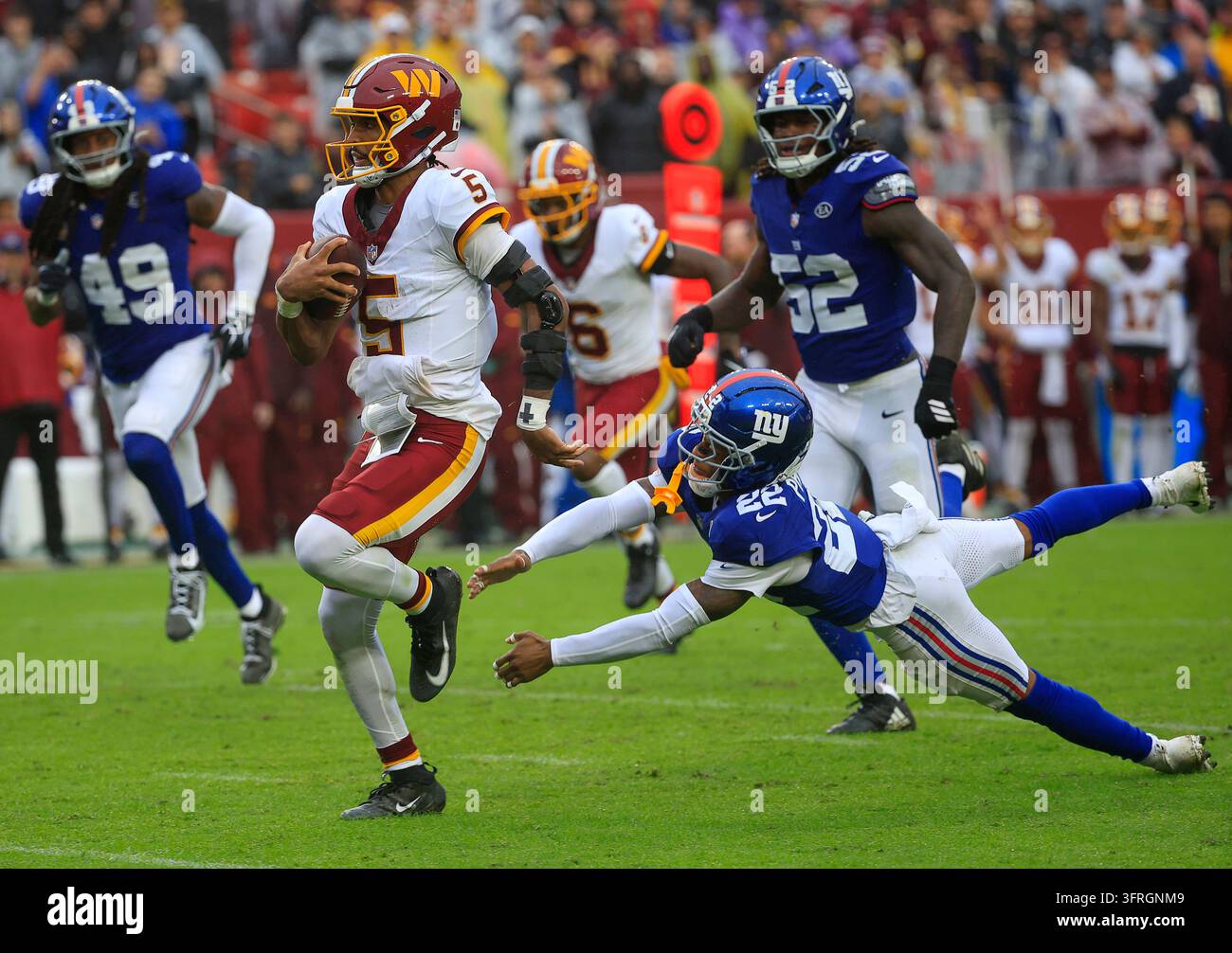 Commanders Vector October 11, 2026: Washington Commanders QB #5 Jayden Daniels runs for a ...