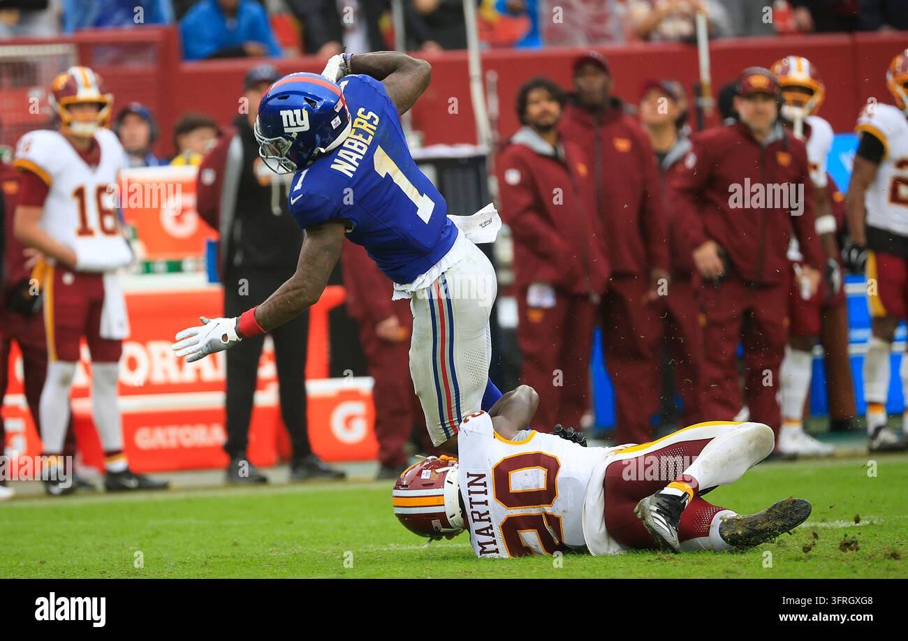 Commanders Vector October 11, 2026: New York Giants WR #1 Malik Nabers is tripped up by ...