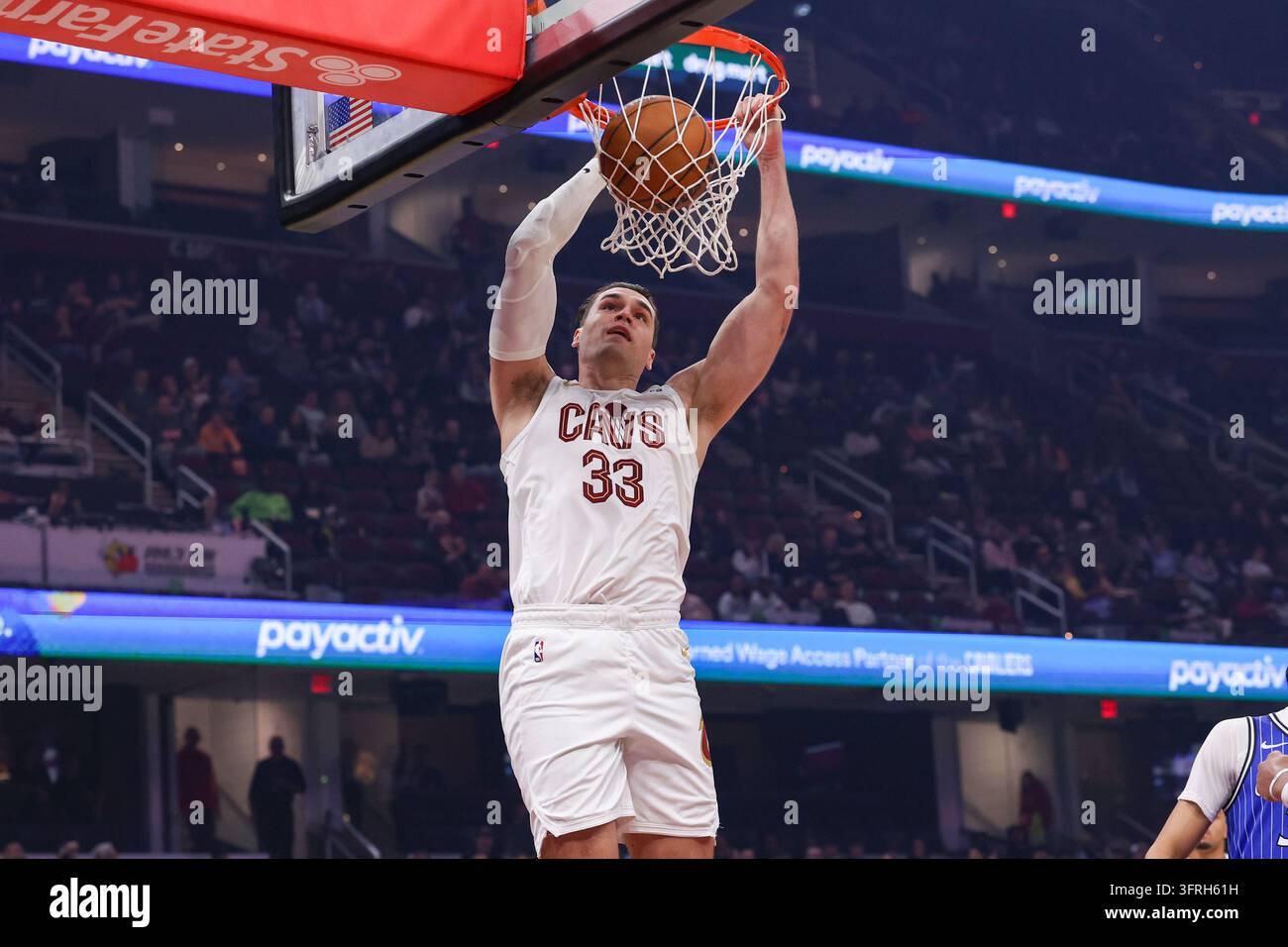 Cleveland cavaliers forward mario hezonja dunks the ball against the orlando magic of an nba basketball game in cleveland sun