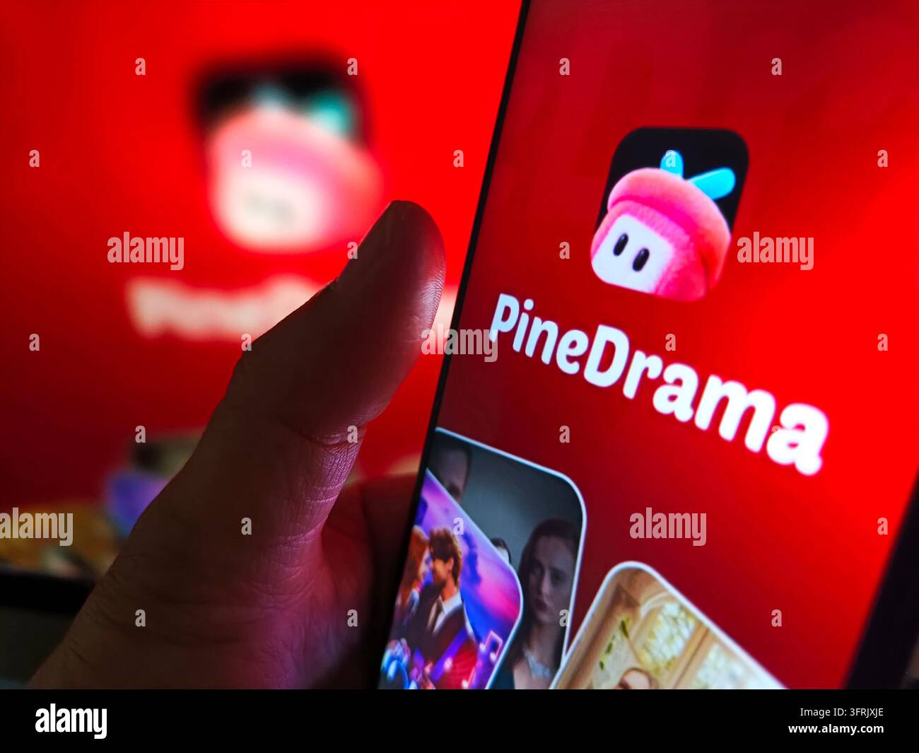 SUQIAN, CHINA - OCTOBER 12, 2026 - A netizen is using his mobilephone ...