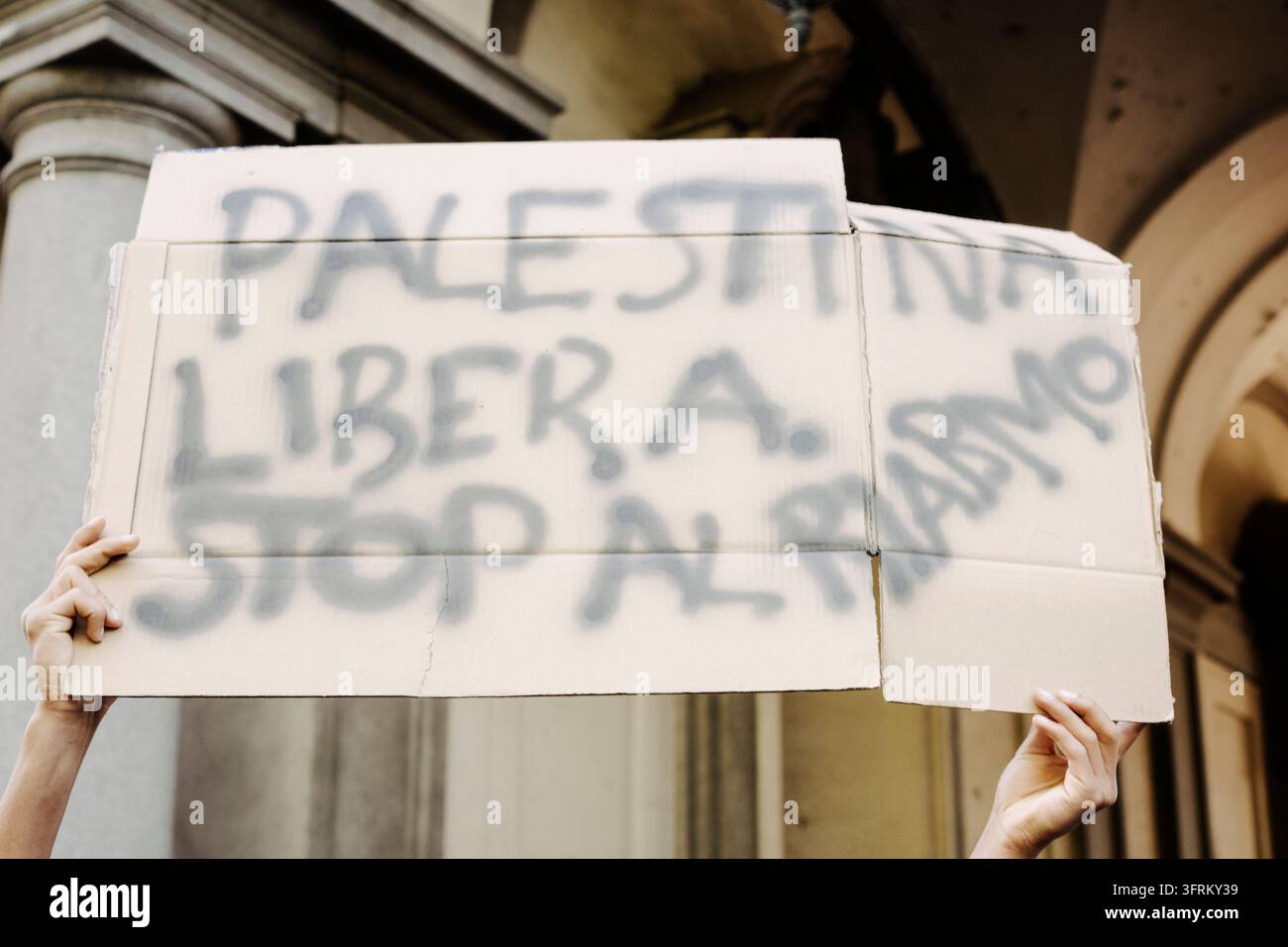 Stop Sign Vector File Free TURIN, ITALY, OCTOBER 10, 2026: A protester holds a sign reading 'Free ...