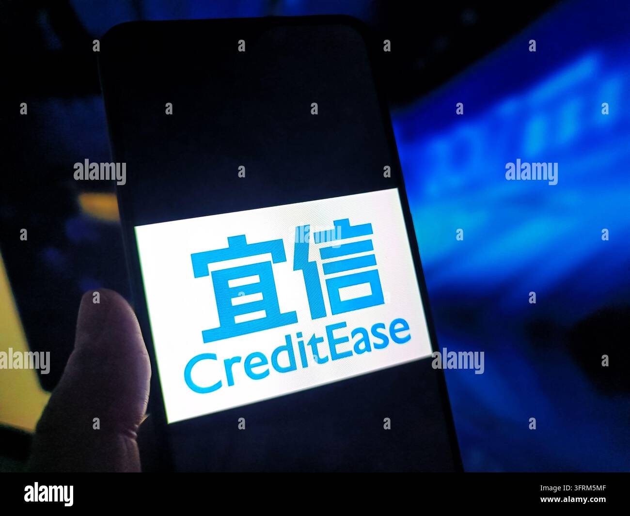 SUQIAN, CHINA - OCTOBER 12, 2026 - A netizen is using his mobilephone ...