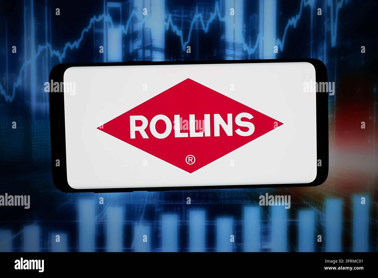 In this photo illustration, the logo of US pest control company Rollins ...