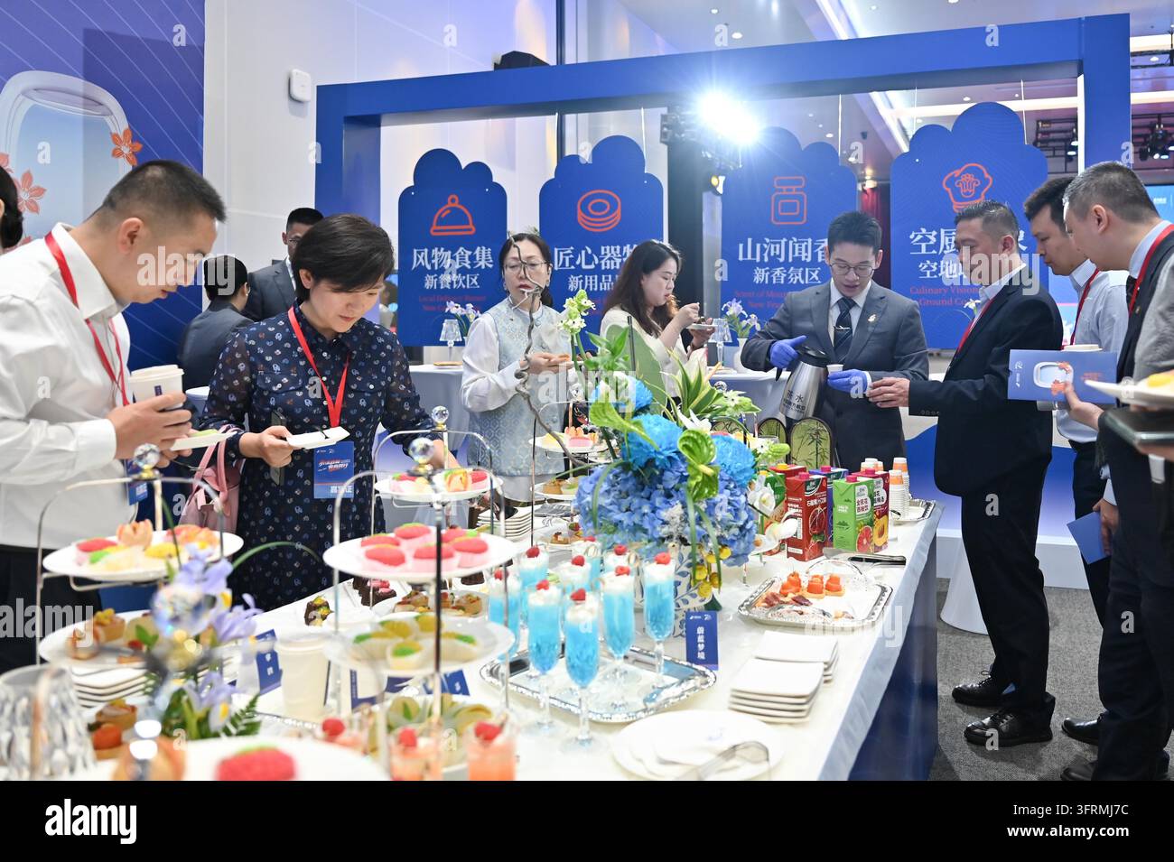Flight Service **CHINESE MAINLAND, HONG KONG, MACAU AND TAIWAN OUT**Attendees taste ...