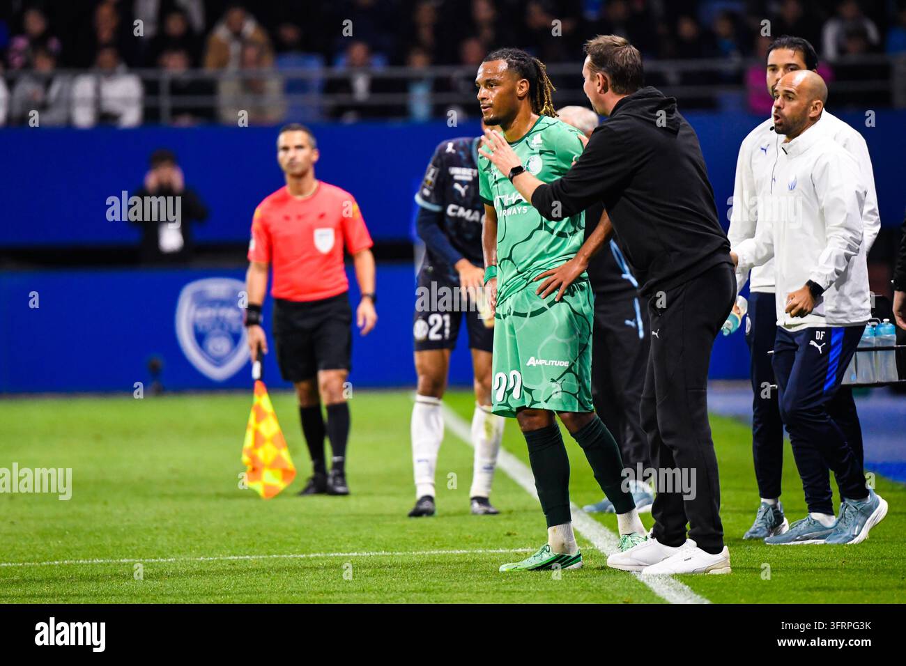 Stephane DUMONT head coach of Troyes gives instructions to Iron GOMIS ...
