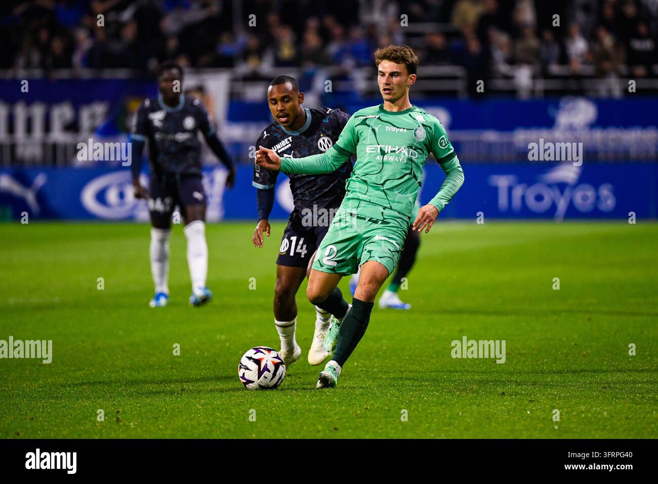 Lucas MARONNIER of Estac Troyes and Igor PAIXAO of Olympique de ...