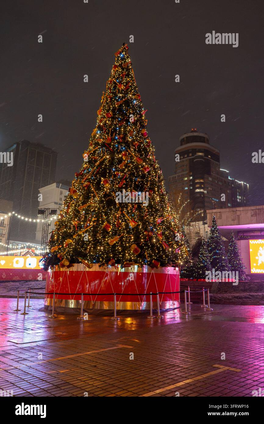 Large Decorated Christmas Tree with Musical Instrument Ornaments and ...