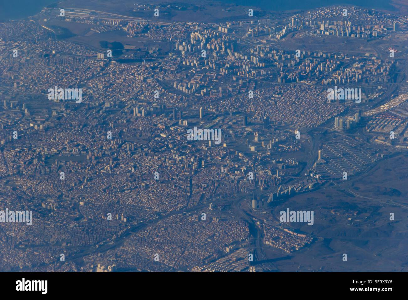 Winding Riger High-angle aerial photo showing a dense urban cityscape of residential ...