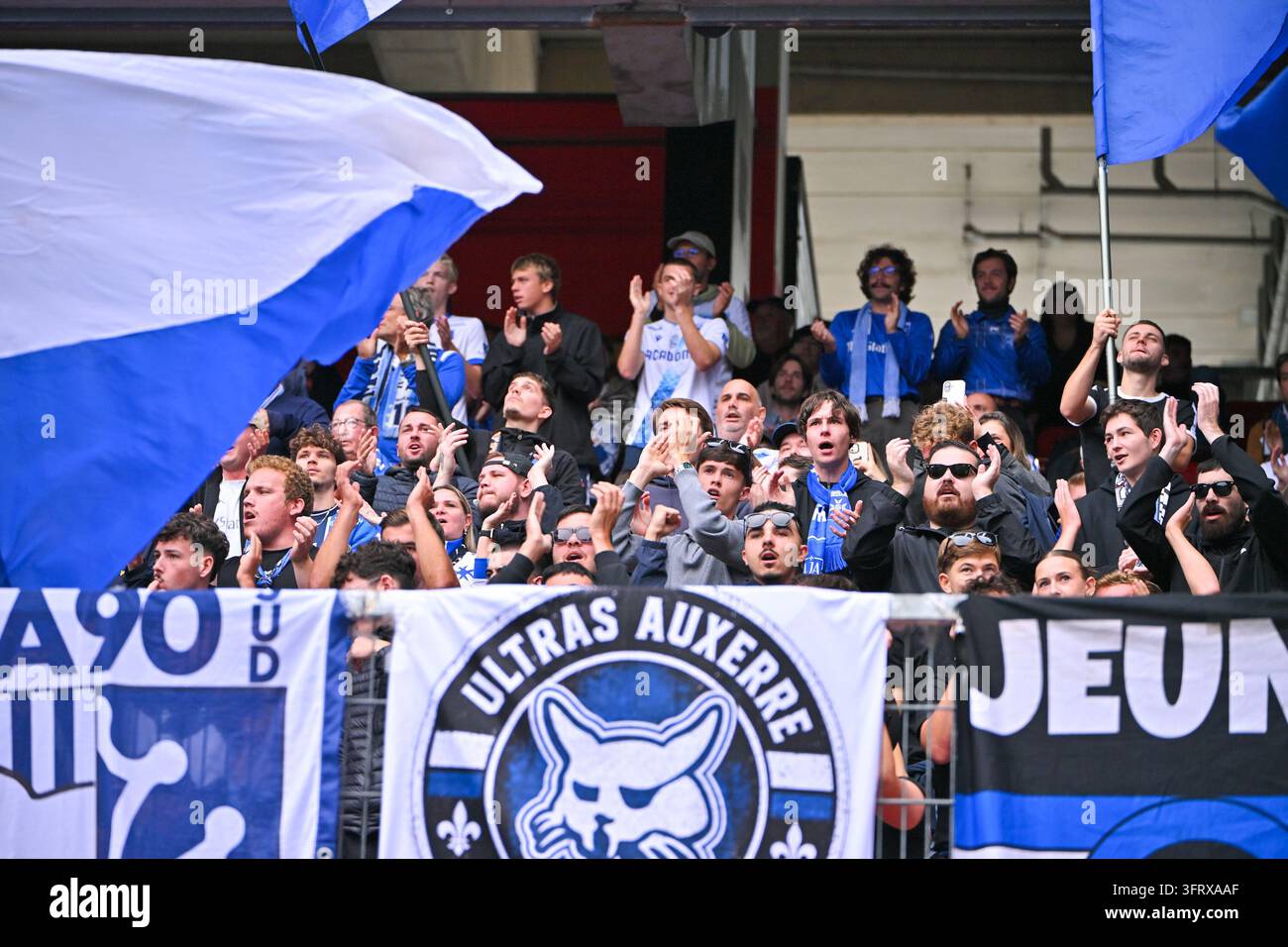 Fans of Auxerre during Ligue 1 McDonald's match between Rennes and ...