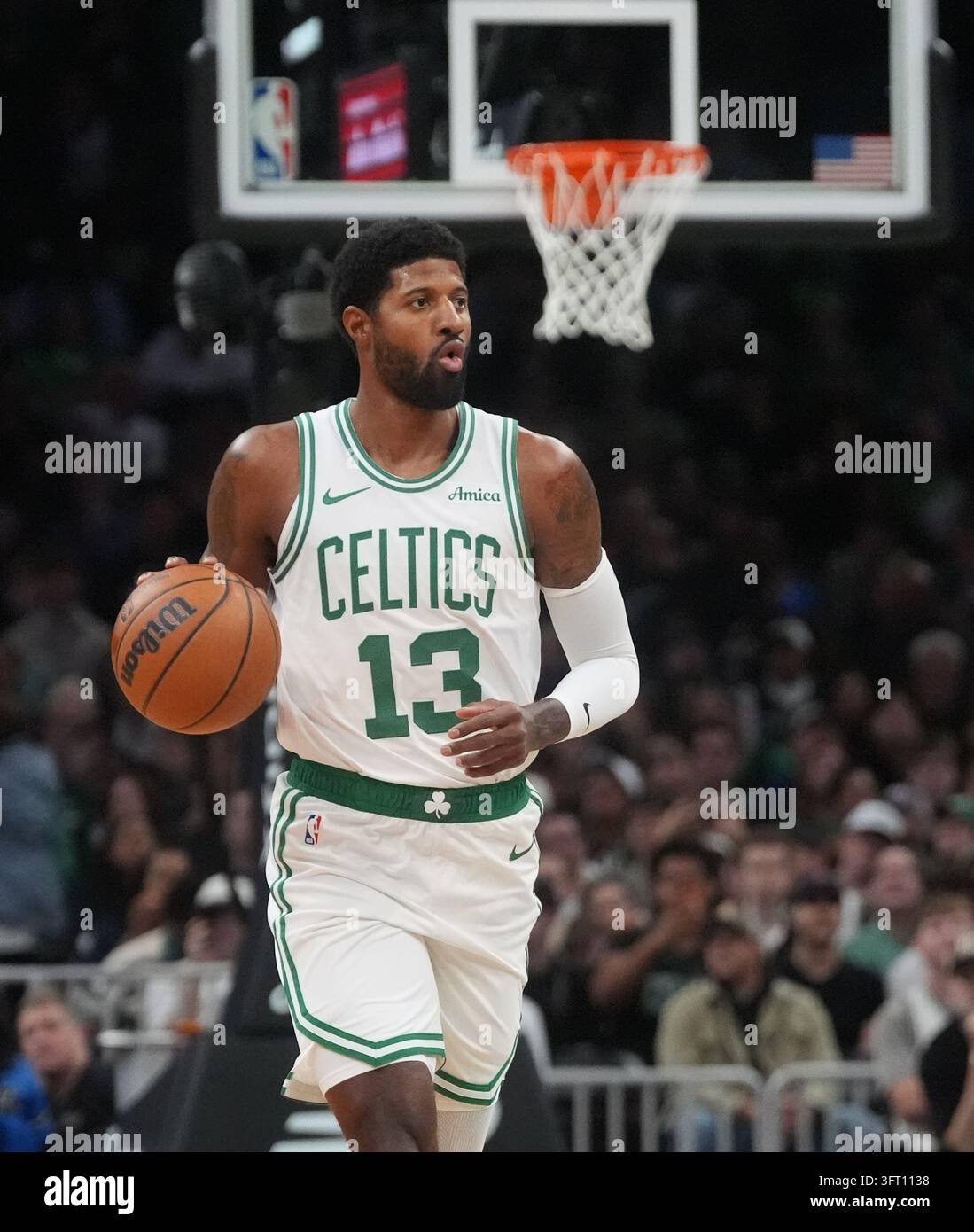 Boston celtics forward paul george during a preseason nba basketball game sunday oct in boston photocharles krupa