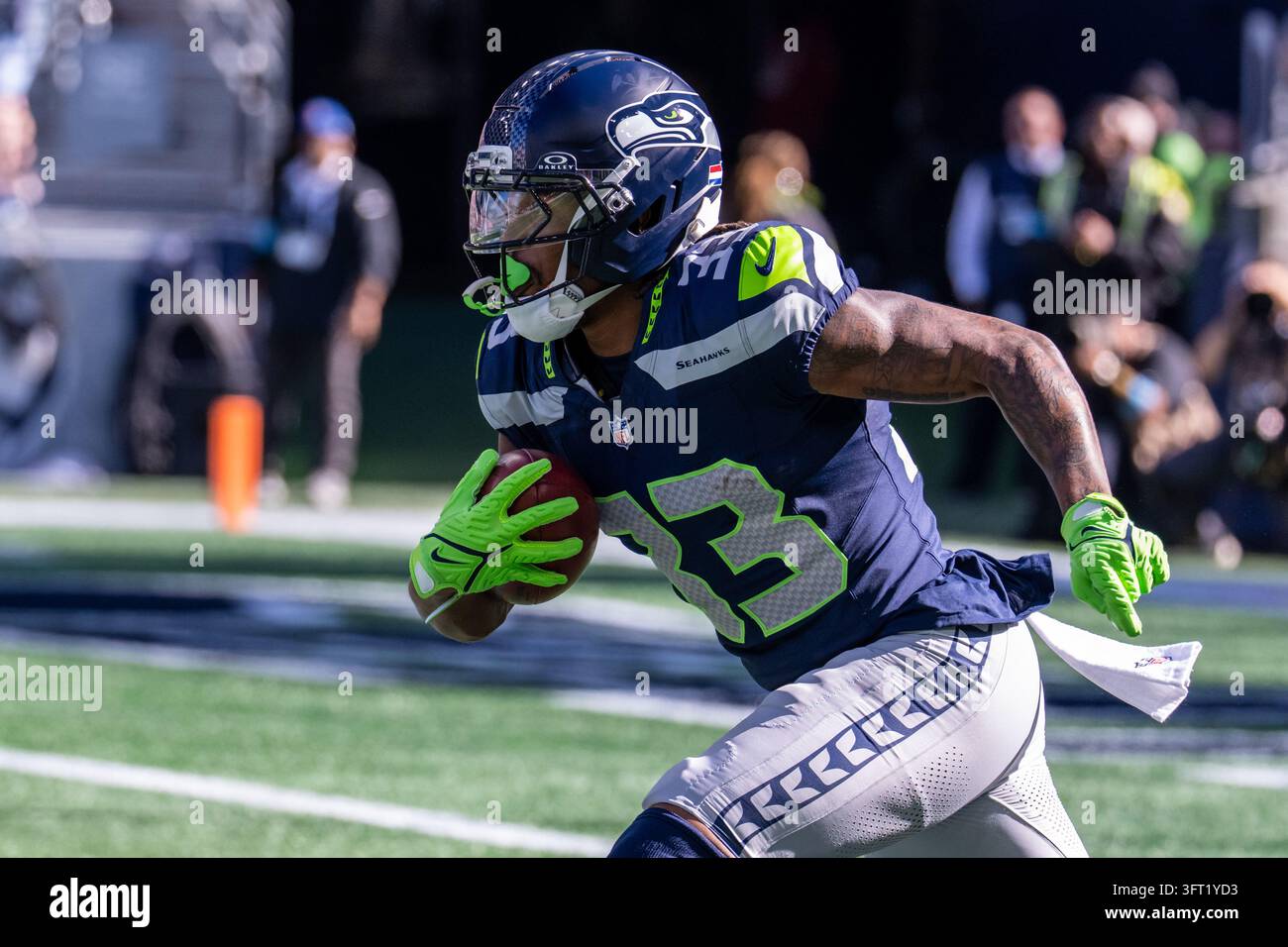 Seattle Seahawks running back Velus Jones Jr. runs with the ball during ...