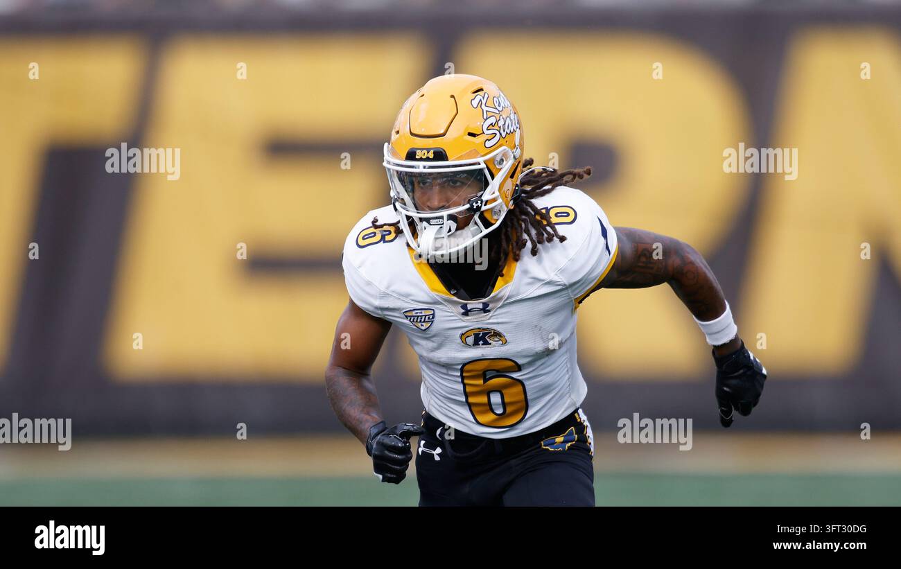 Harris Database Program Kent State wide receiver Wayne Harris plays during an NCAA college ...