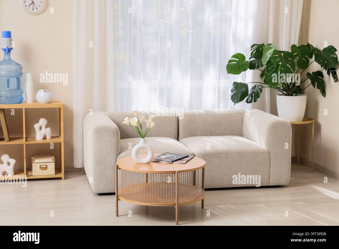 Interior design and home comfort, modern living room with beige sofa ...