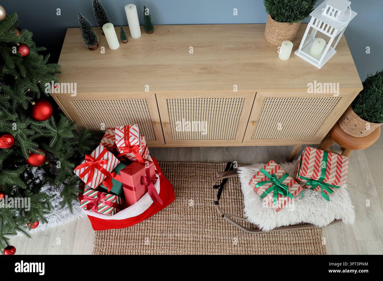 Christmas holiday preparation, festive gift boxes in santa sack and on ...