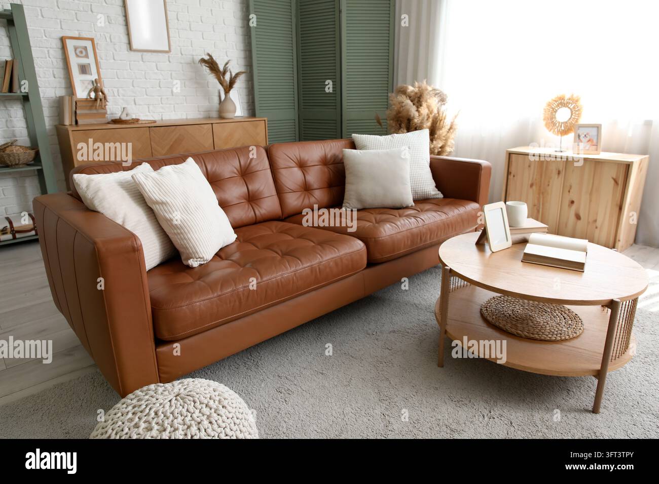 Interior design and home comfort, modern living room with brown leather ...