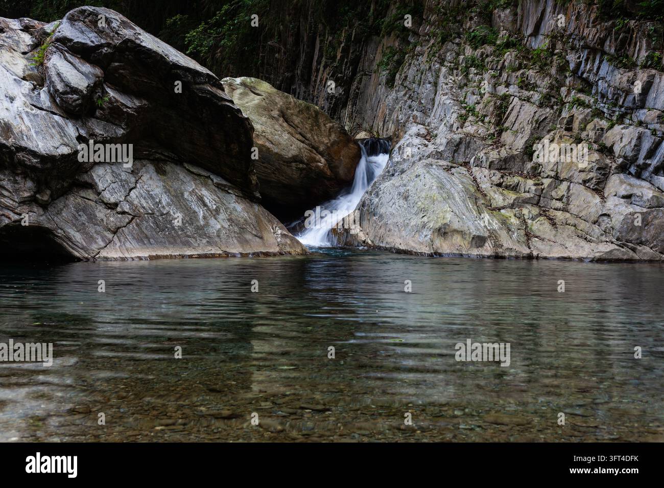 Sanzhanxi river waterfall in Taroko National Park. Rocky landscape with ...