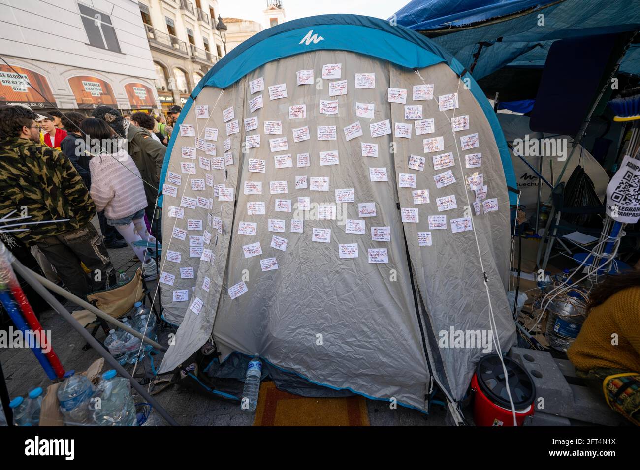 Message Communication Drawing A close-up of a tent bearing messages relating to the protest over ...