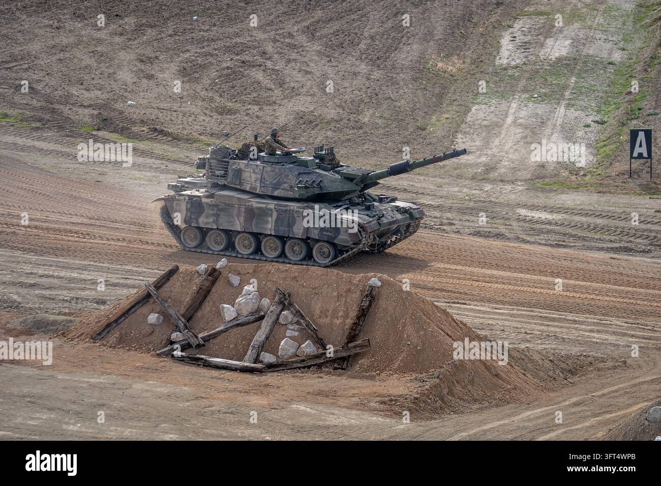 Turkey Rocket Ranges A Turkish Army M60T main battle tank kicks up a dense cloud of dust and ...
