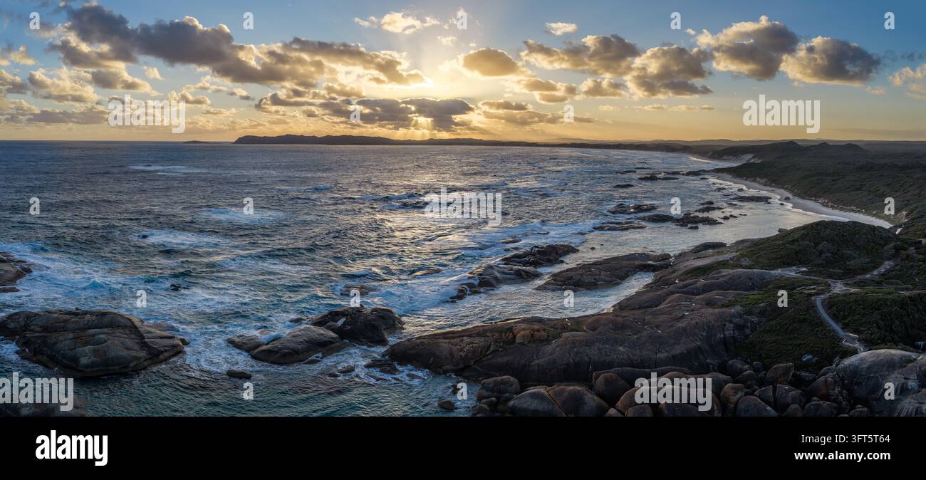 Aerial view of William Bay National Park at sunset with rocky coastline ...