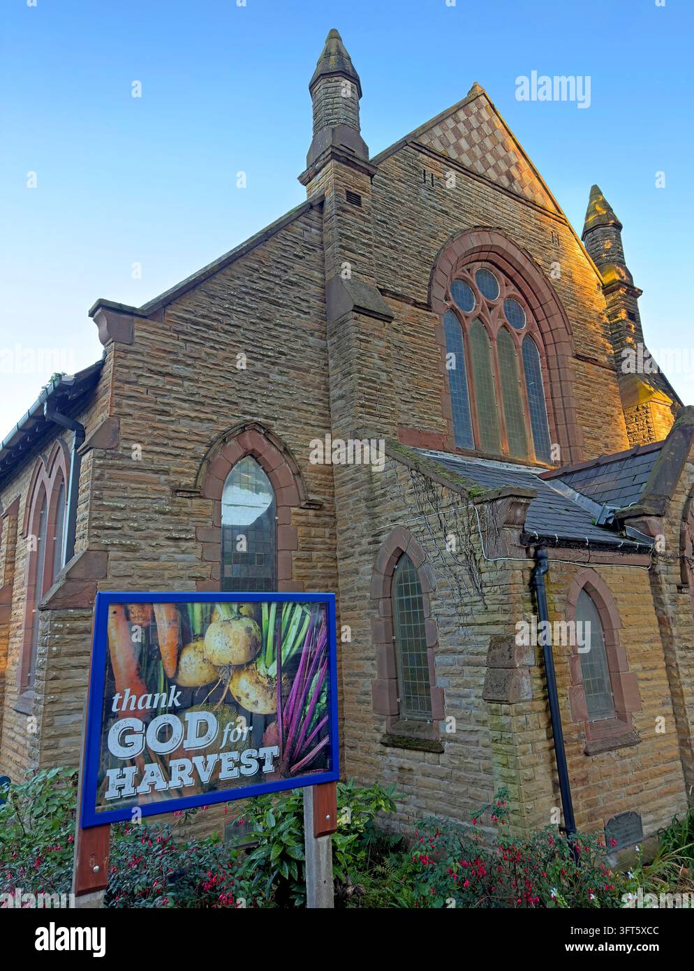 Thank God for Harvest banner displayed on a church building in Warrington. Stock Photo