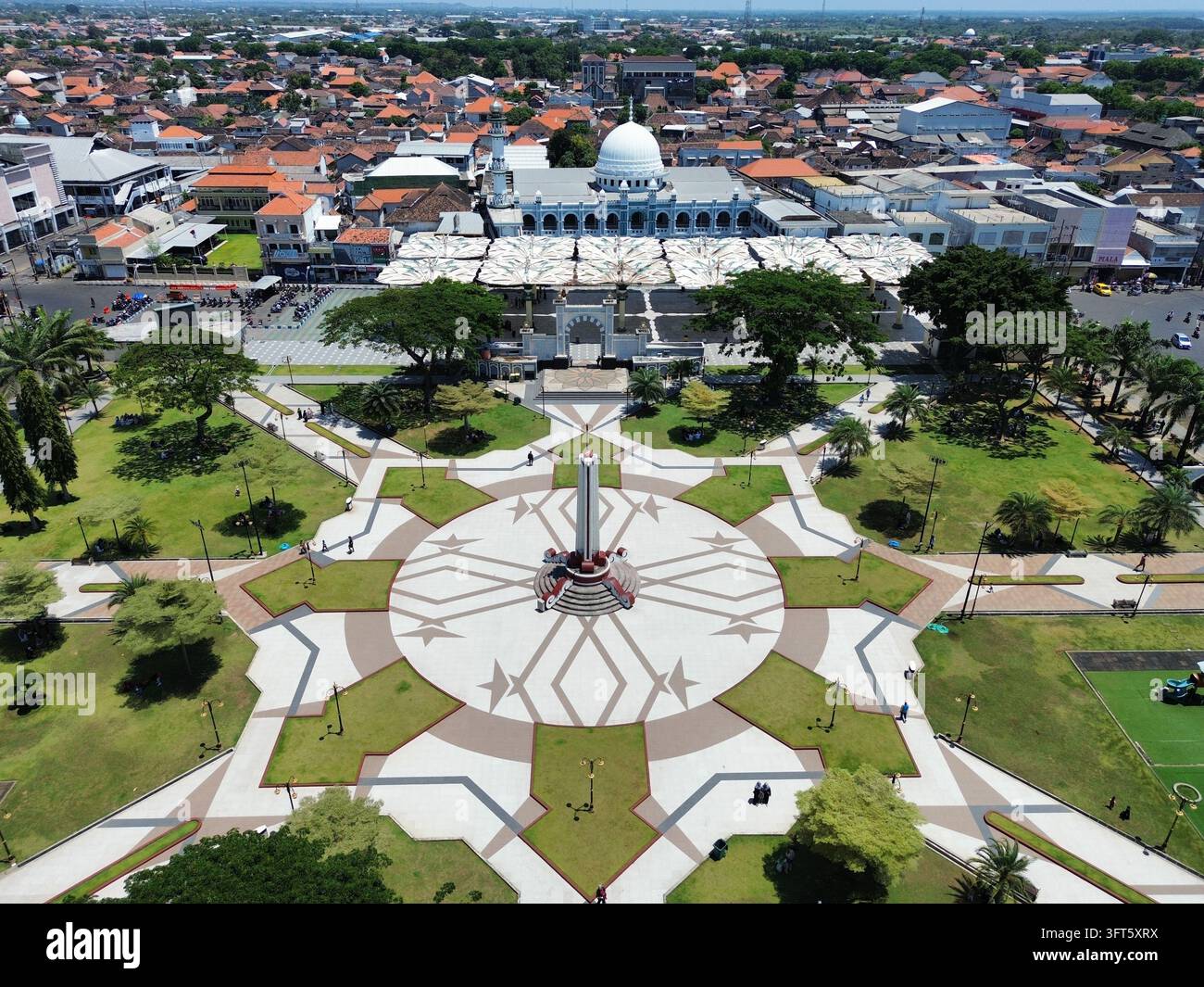 Aerial view of Alun-Alun Pasuruan with a central monument, geometric ...