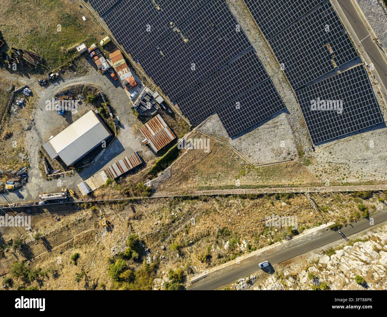 Aerial view of Vau i Dejes Hydropower Plant featuring extensive solar ...