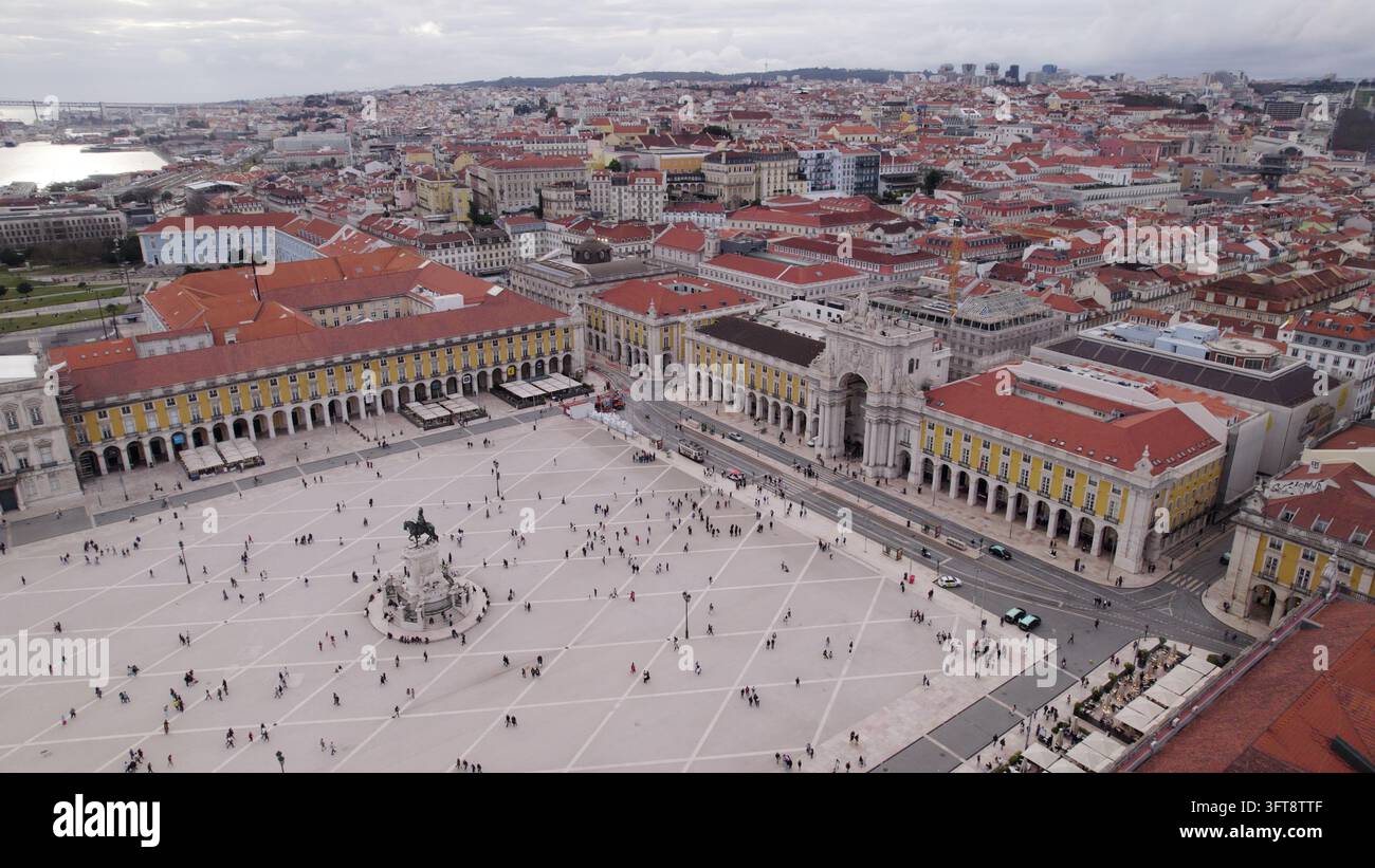 Aerial view of Praca do Comercio with its iconic yellow buildings, the ...