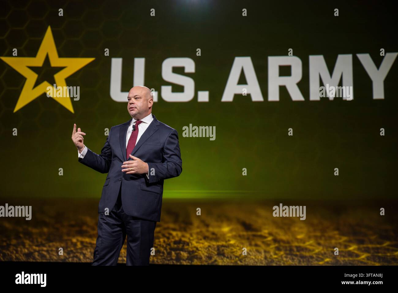 Adam Telle, Acting Secretary of the Army, speaks at the opening ...