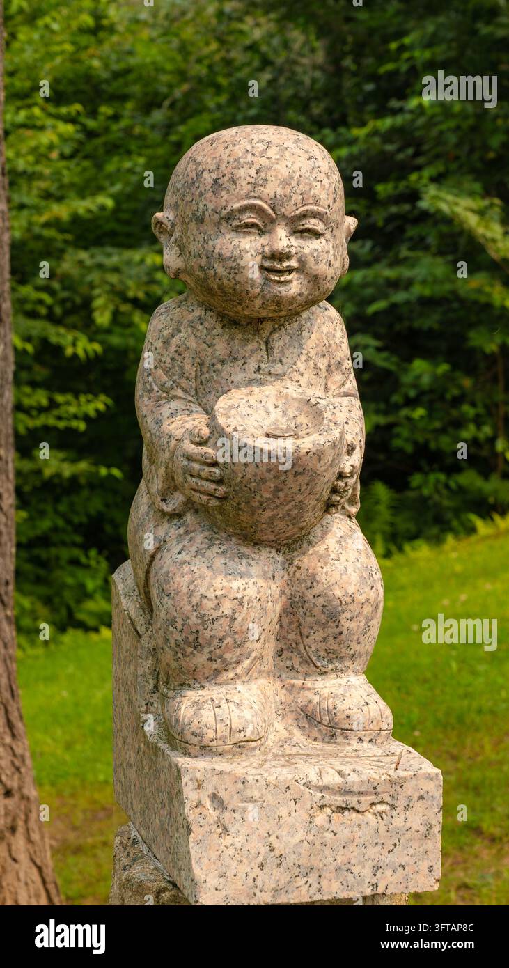 Harrington QC, Canada - August 03, 2025: Stone statue depicting a ...