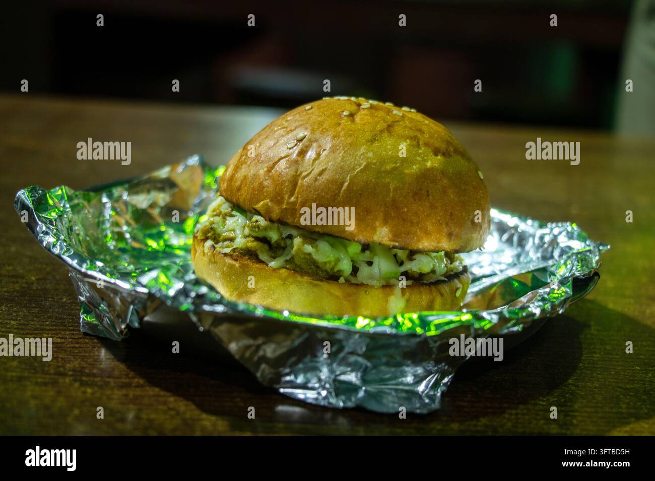 Savory grilled chicken sandwich featuring toasted golden bun and creamy ...