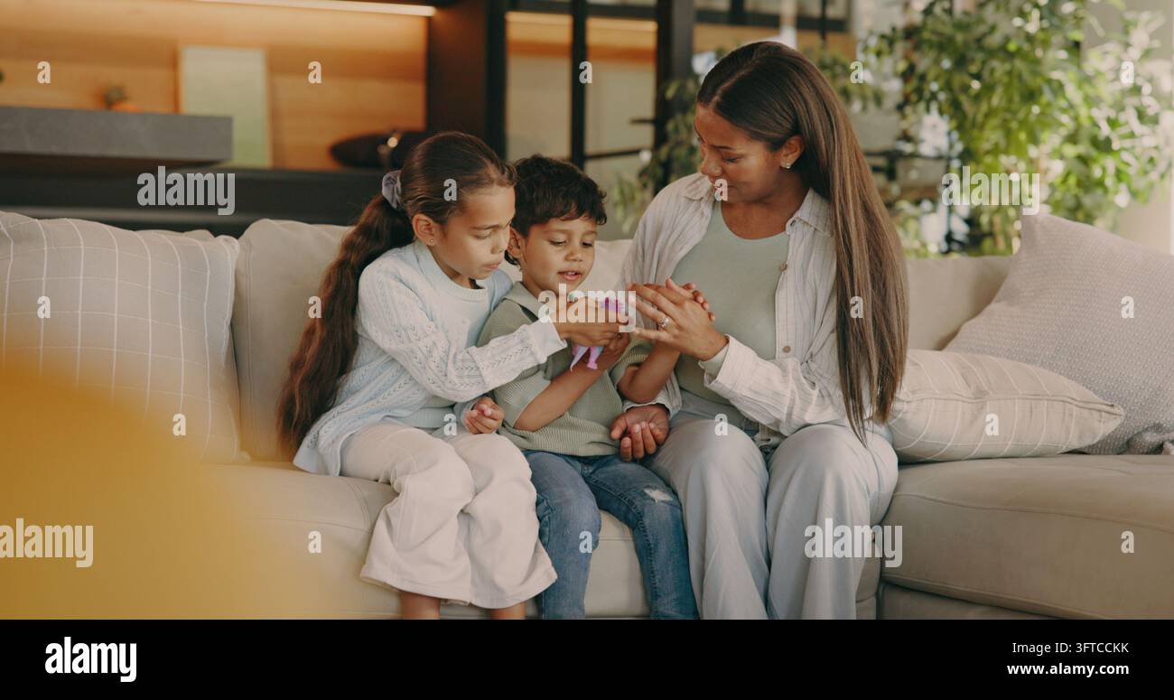 Weekend Connecting Happy, toys and children with mom on sofa for bonding, connection and ...