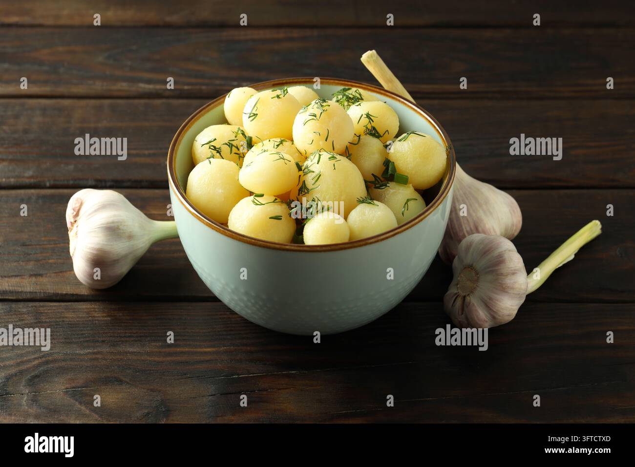 Concept of tasty food with boiled young potatoes Stock Photo - Alamy