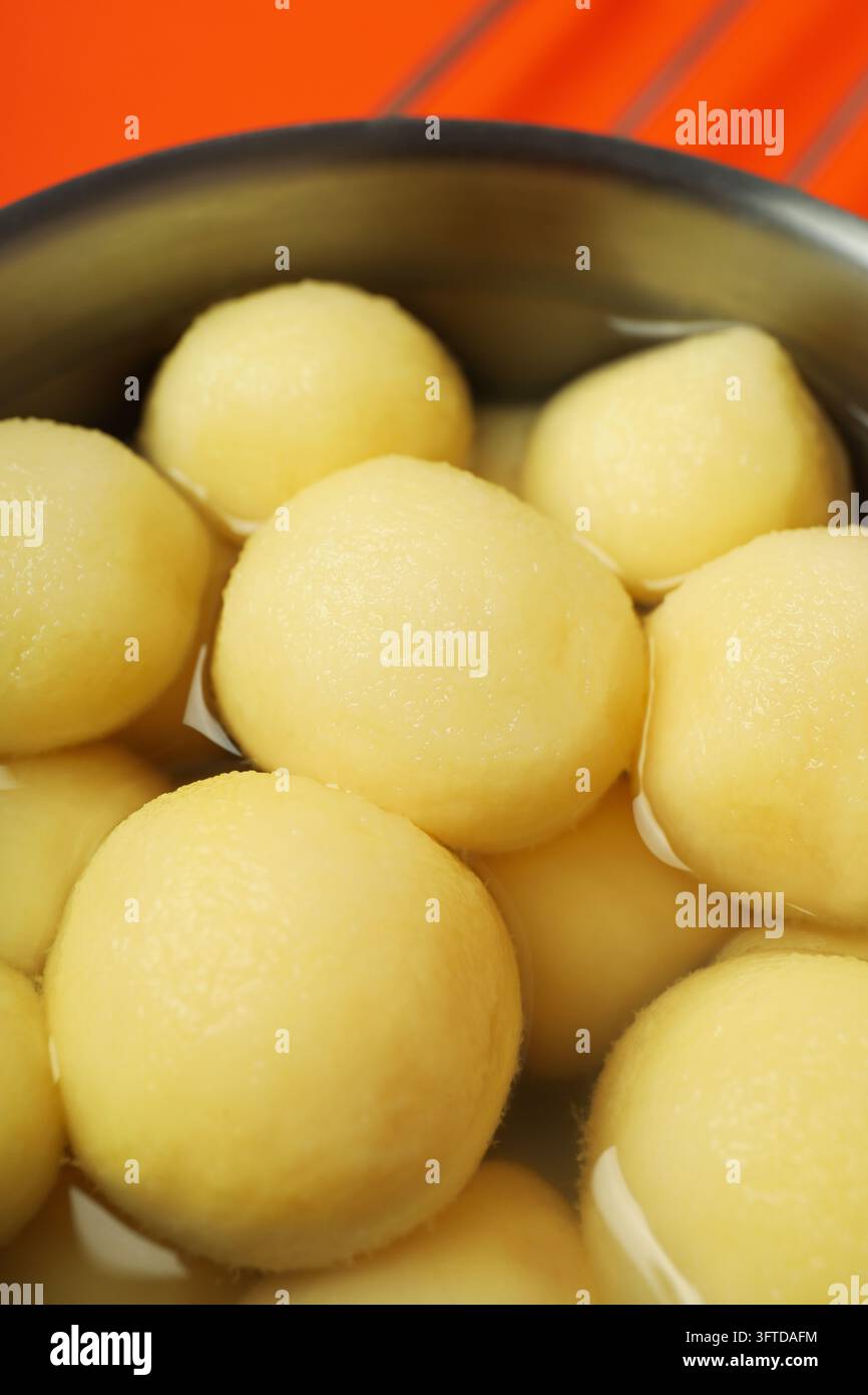 Concept of cooking with boiled young potatoes Stock Photo - Alamy