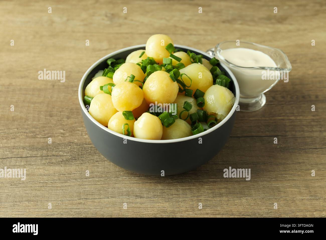 Concept of tasty food with boiled young potatoes Stock Photo - Alamy