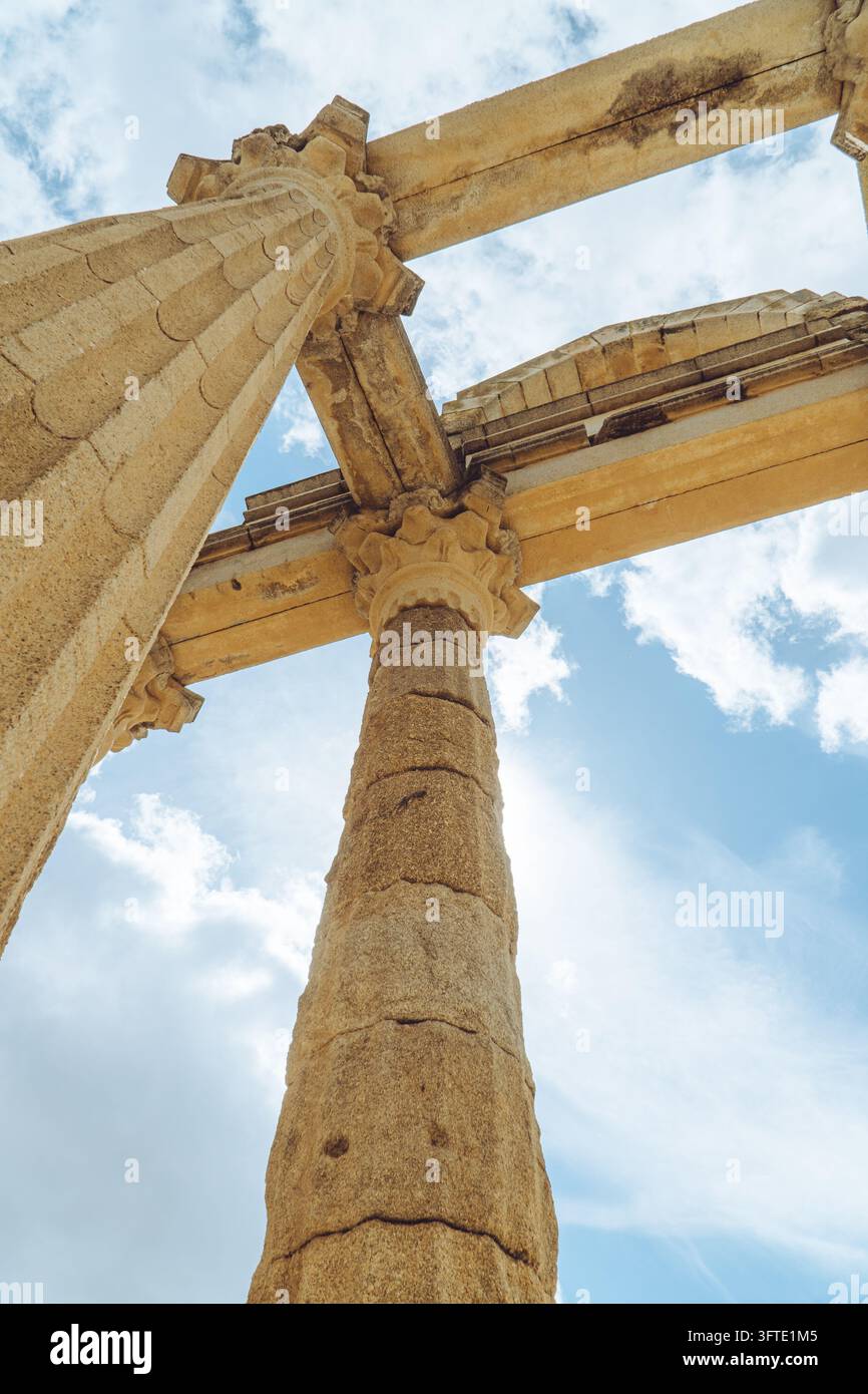 Ancient Roman columns rising into the blue sky at the Temple of Diana ...