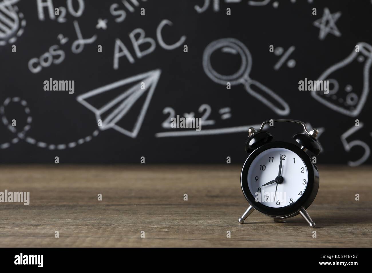 Concept of time management with alarm clock Stock Photo - Alamy