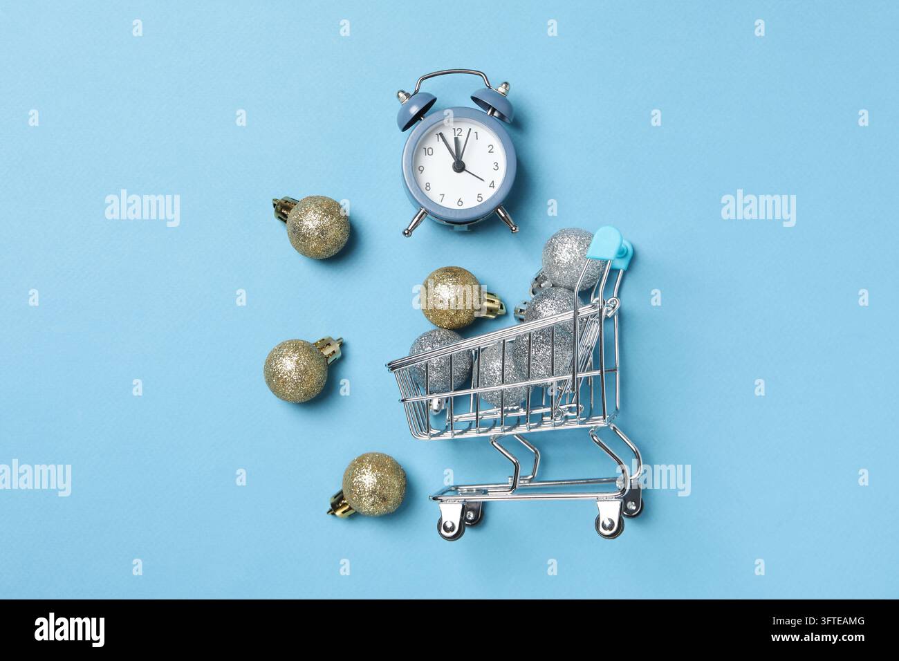 Concept of Christmas shopping time with alarm clock Stock Photo - Alamy