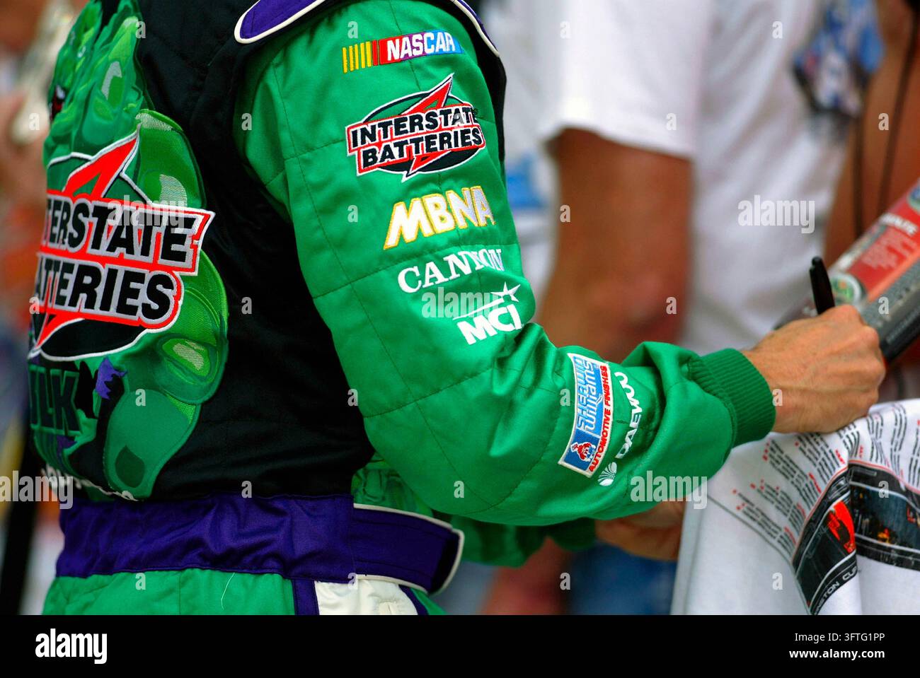 June Labonte Joe Gibbs Racing driver Bobby Labonte signs autographs for a crowd of ...