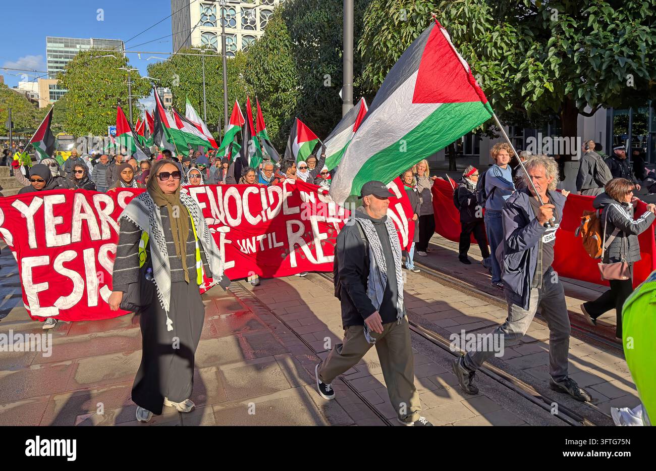Palestine march behind red Gaza banner in Manchester on 10 October 2026 Stock Photo