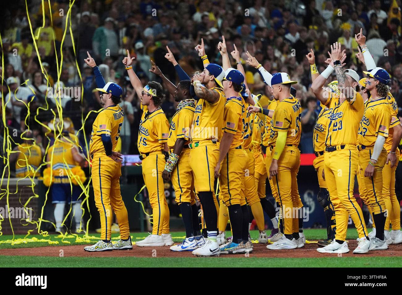 FILE - The Savannah Bananas celebrate their win over the Firefighters ...