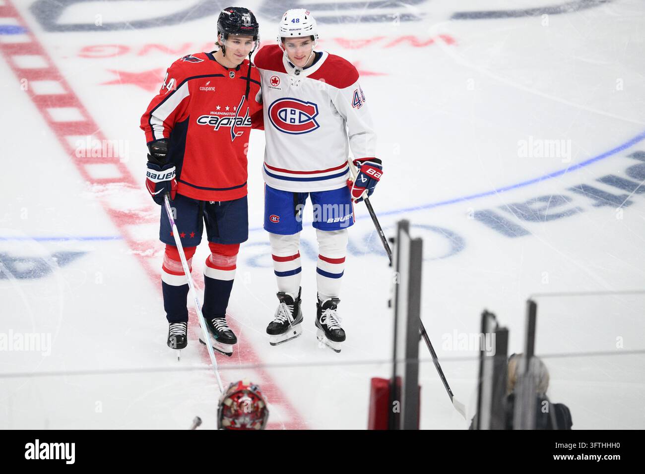 Washington Capitals defenseman Cole Hutson (44) and his brother ...