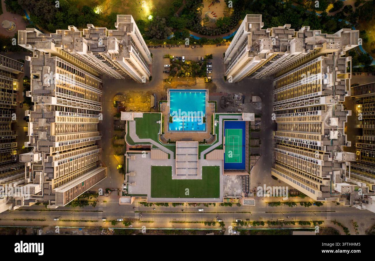 Aerial view of a modern residential complex featuring high-rise ...