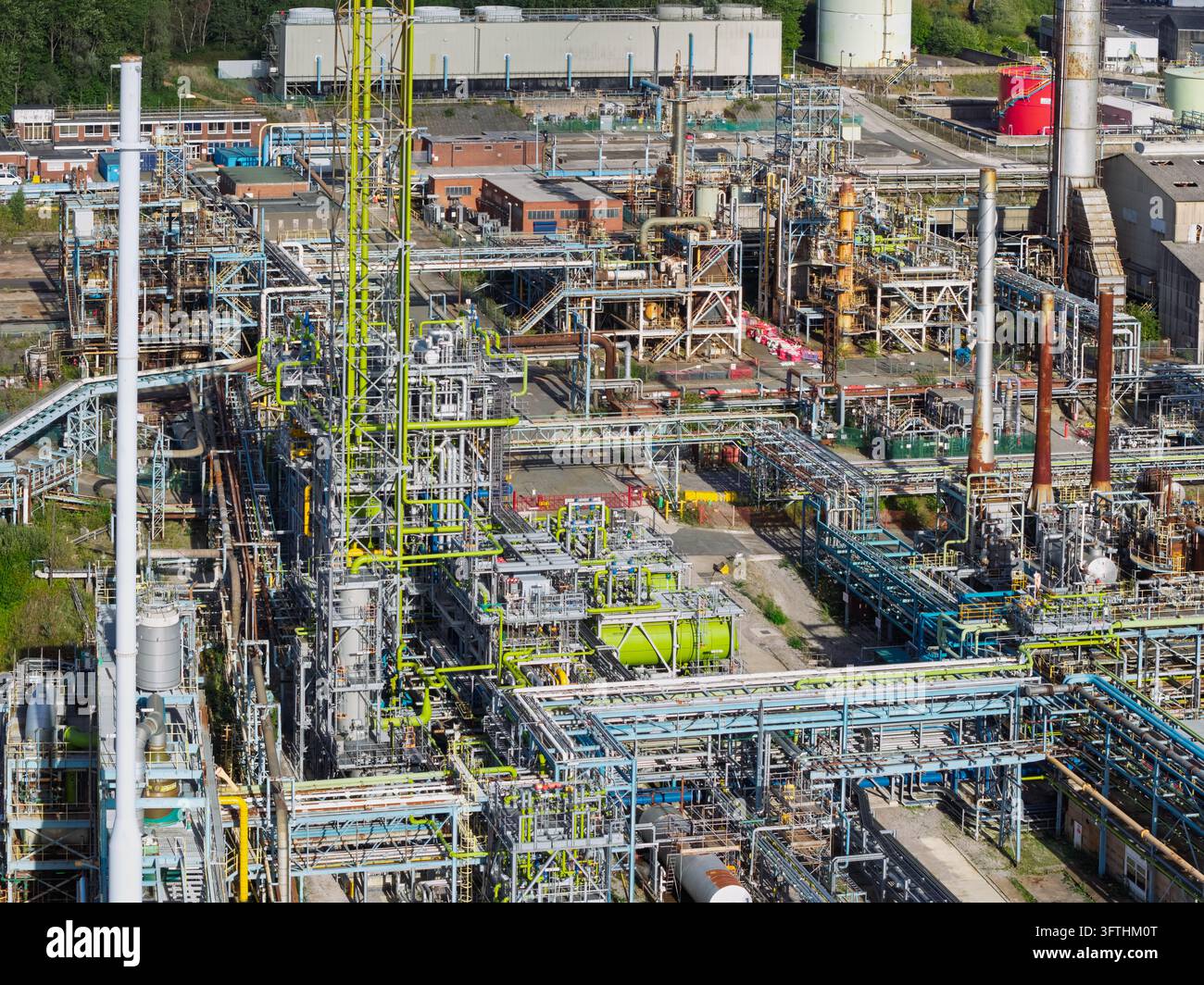 Model Tank Shelf Aerial view of a chemical plant with complex piping systems ...