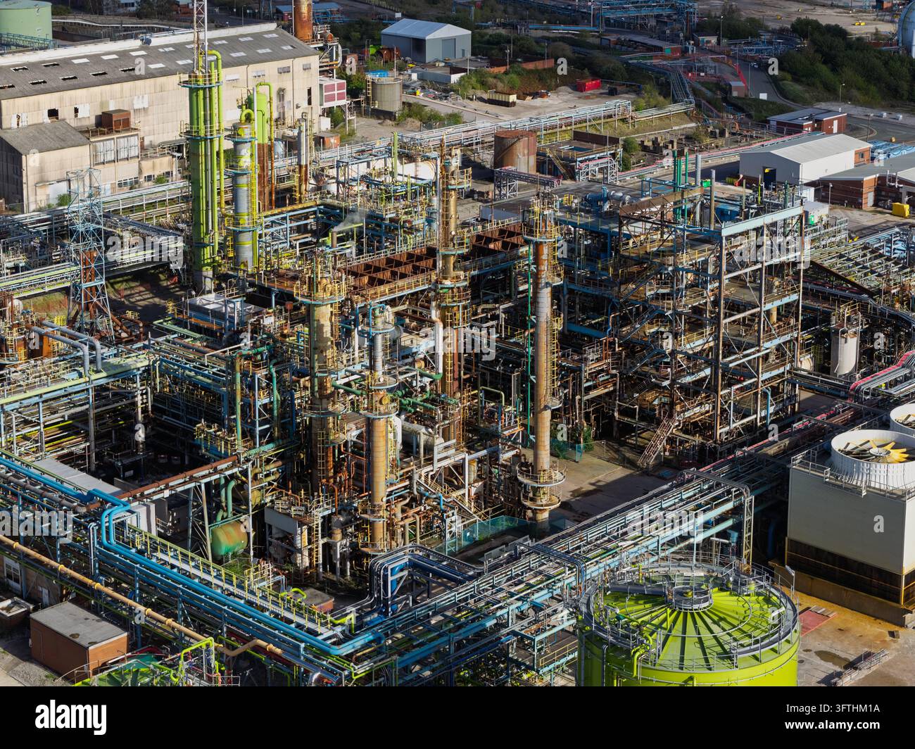 Distorlation Aerial view of a large industrial chemical plant with complex piping ...